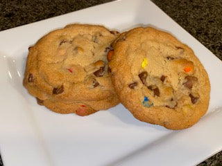 Thick, golden-brown cookies studded with colorful M&M candies, crisp on the edges and soft in the center.